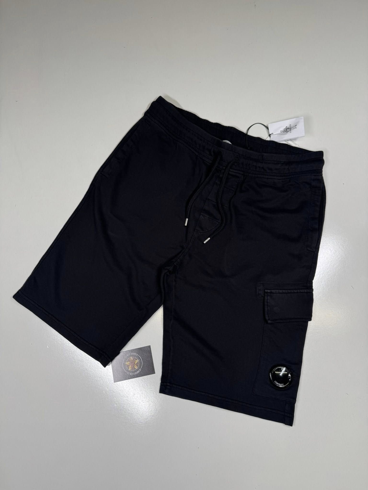 712603907_922528064208838_1865264767661904117_n CP Company Light Fleece Cargo Lens Shorts. Black / 999 - Image 1