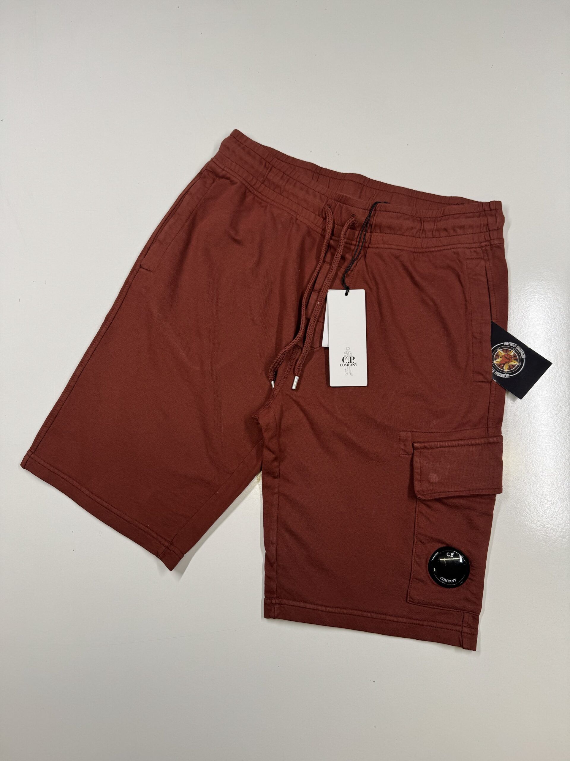 img_4329 CP Company 069A Light Fleece Bermuda Shorts in Brick - Image 1