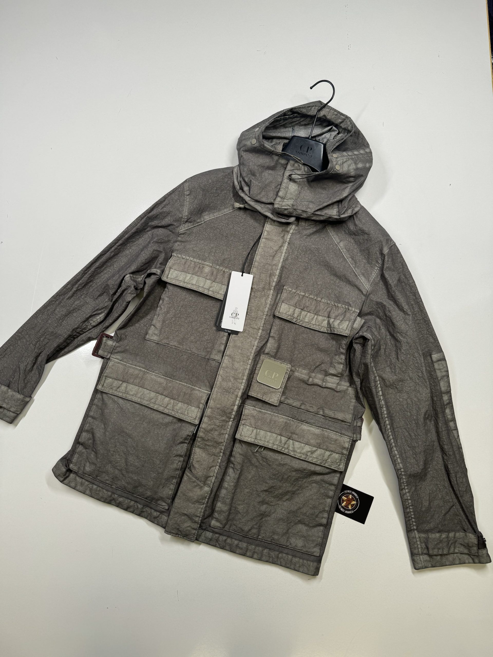 C.P. COMPANY 200A METROPOLIS SERIES CO-TED HOODED JACKET IN MOSS - Image 1