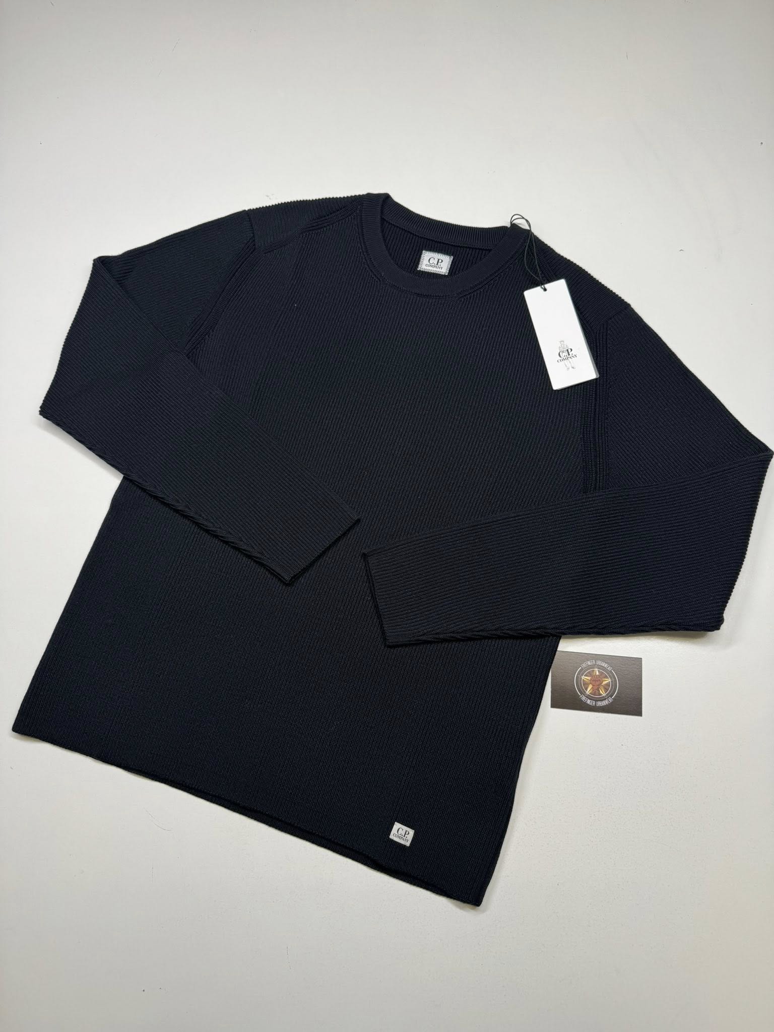 493130984_596736230121358_8268004507794251641_n C.P. Company 353A Re-Wool crew neck pull over in Black - Image 1