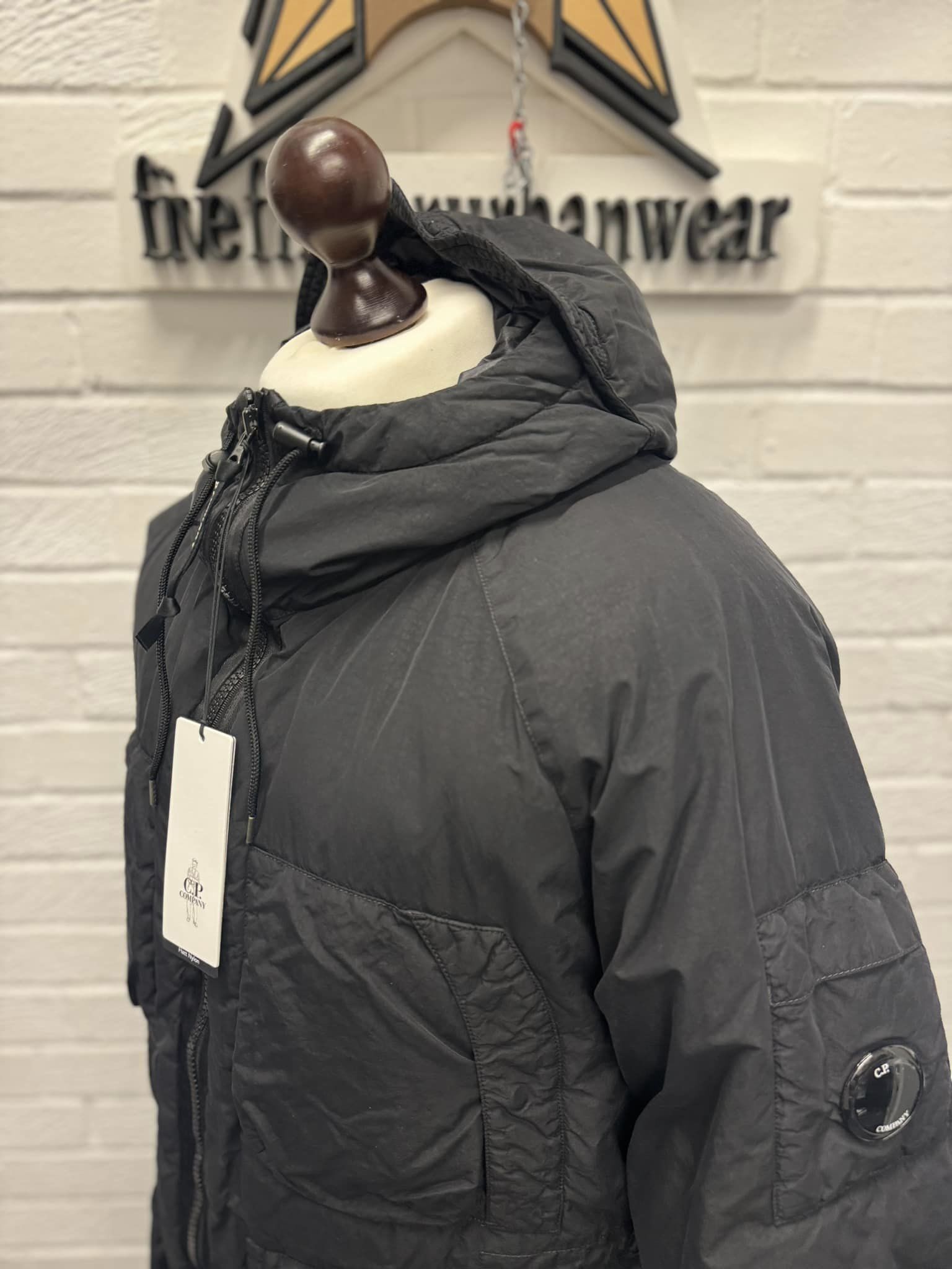 CP Company Flatt Nylon Long down hooded jacket in Black