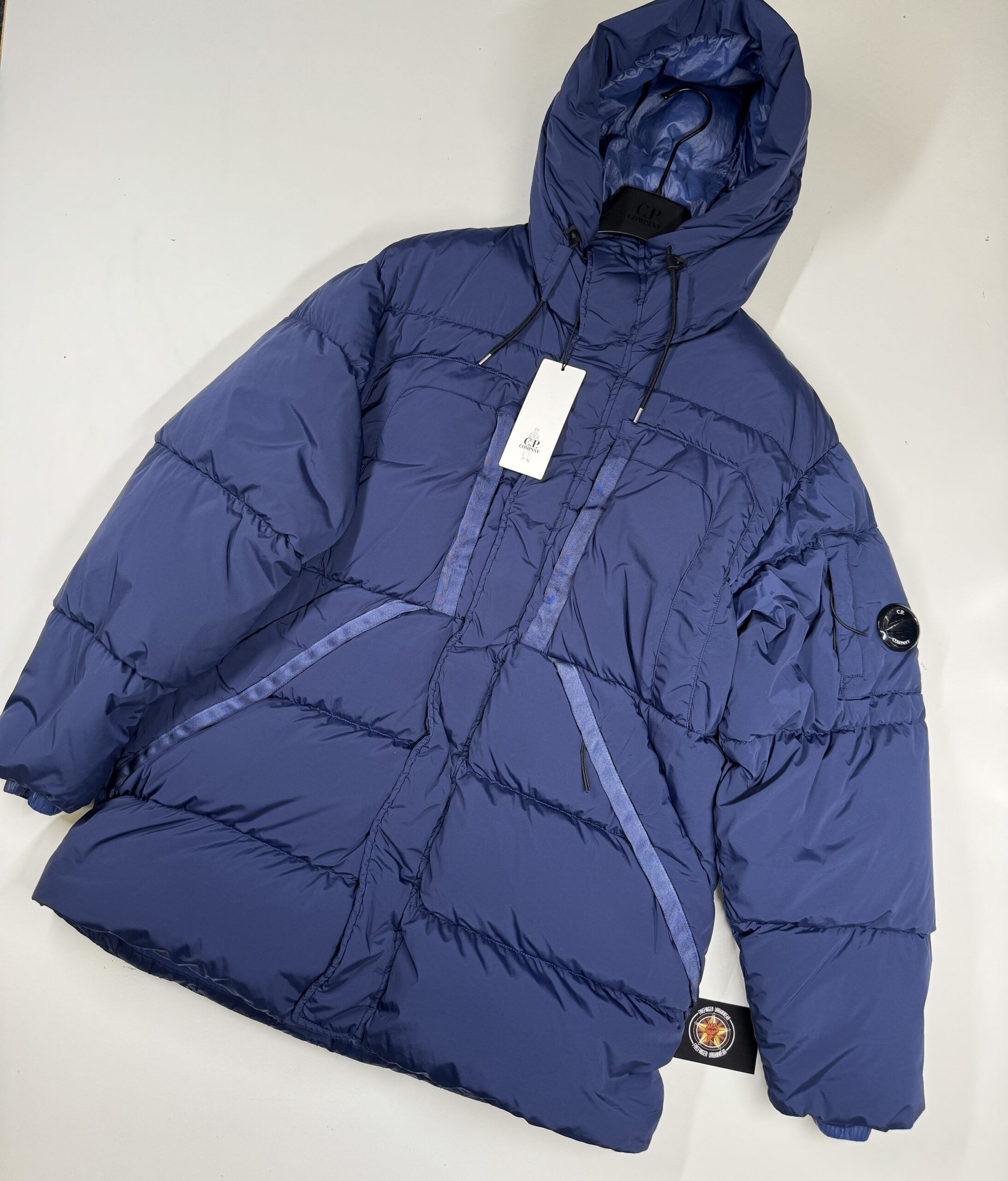 img_8018-3 C.P. COMPANY 173A GARMENT DYED 'NYCRA-R”DOWN LENS HOODED JACKET IN BLUEPRINT - Image 1