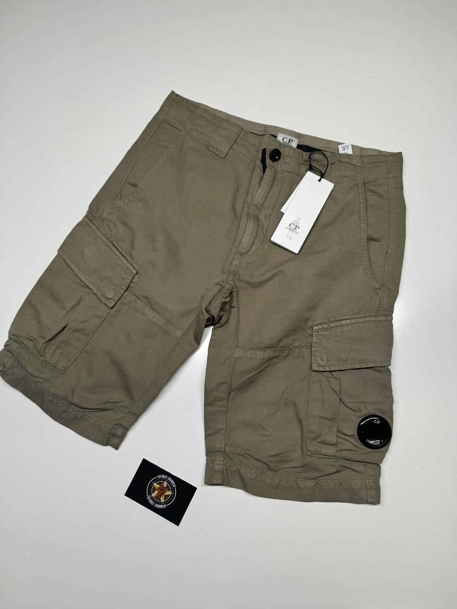 CP company cotton/Linen Bermuda Cargo shorts in moss - Image 1