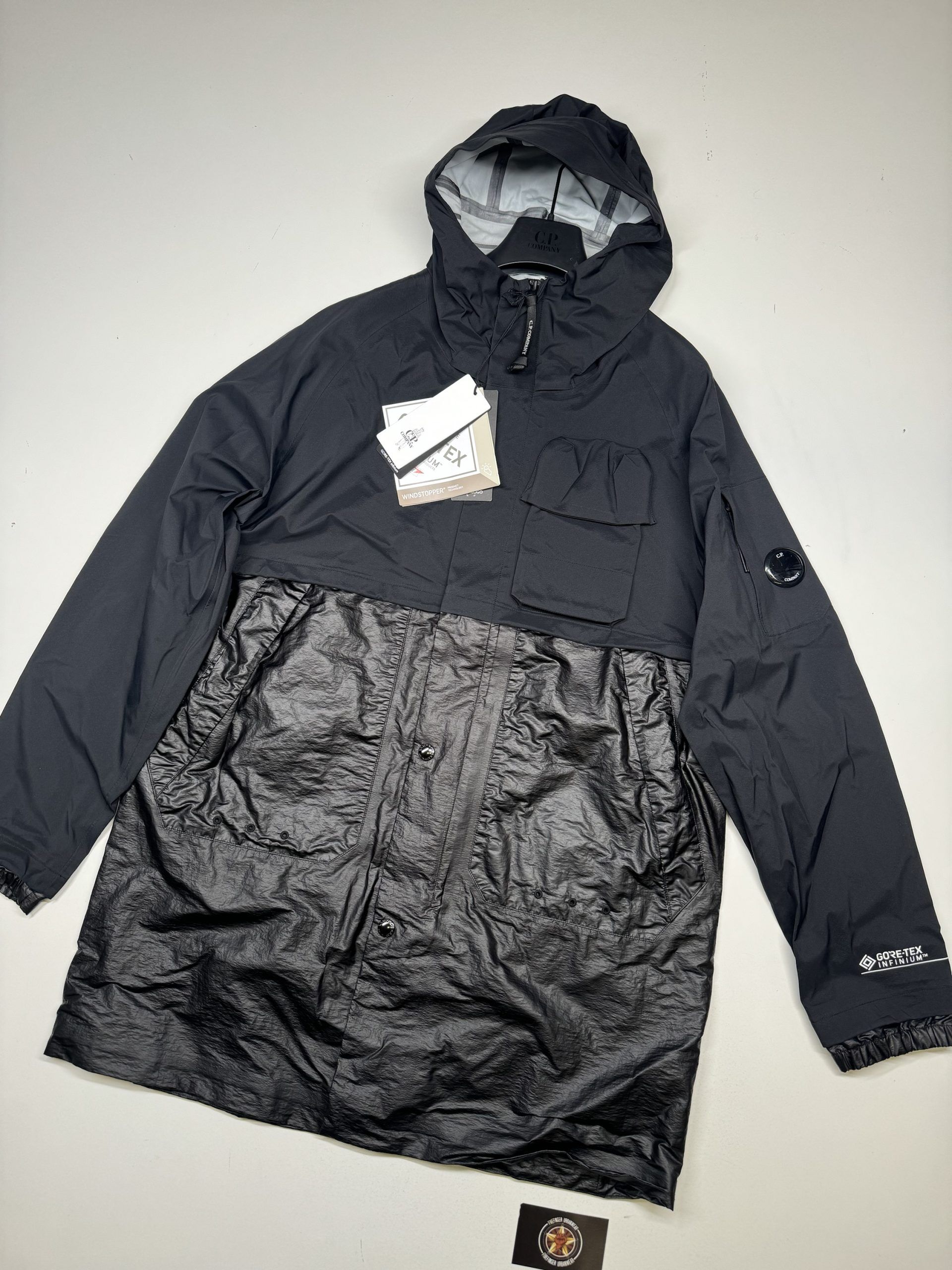 Cp Company 162A Gore-Tex Infinium Windstopper Lens long Jacket in Black - Image 1