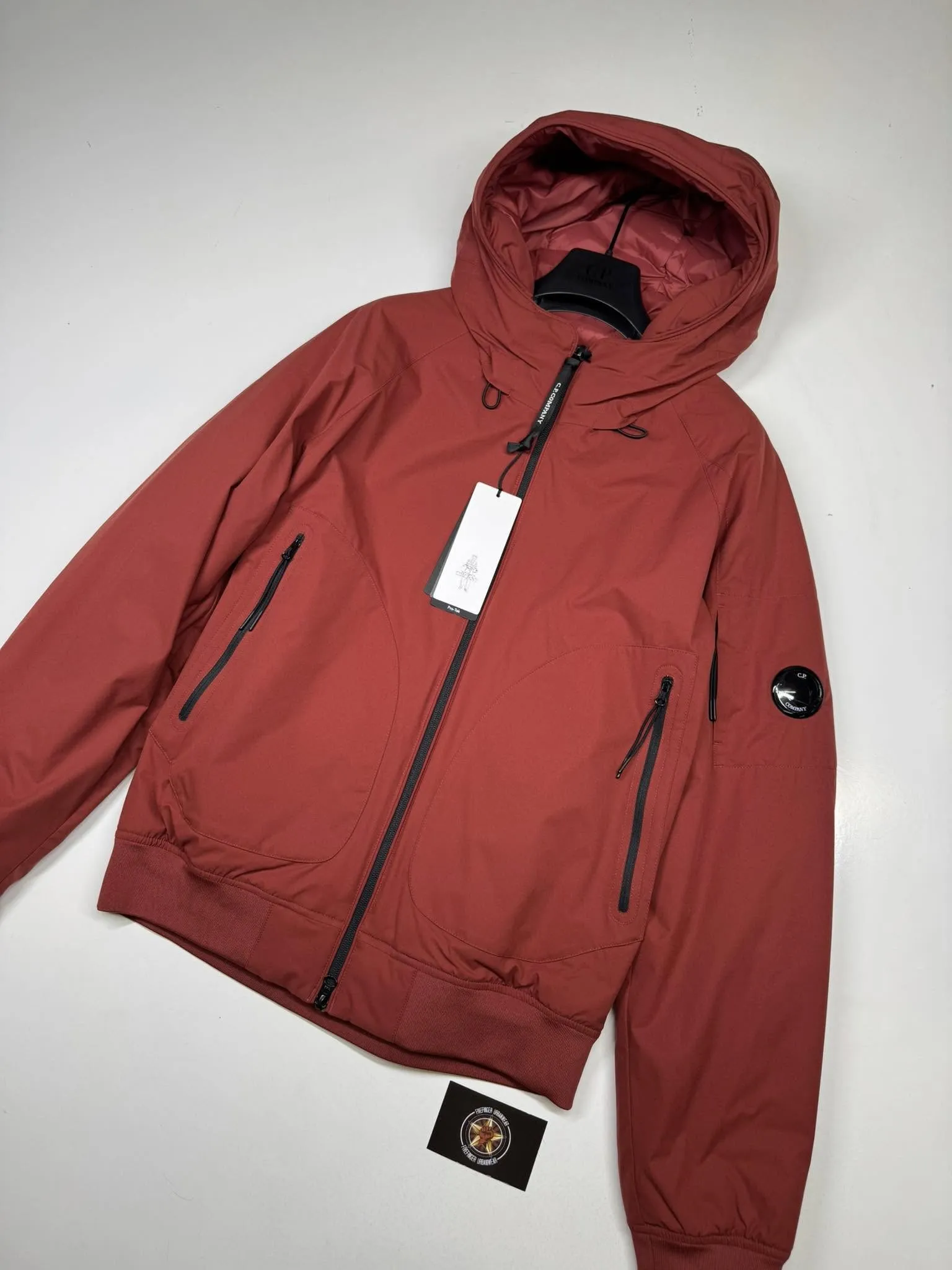 C.P. COMPANY 173A Pro-Tek Hooded Primaloft Padded Jacket in Red - Image 1