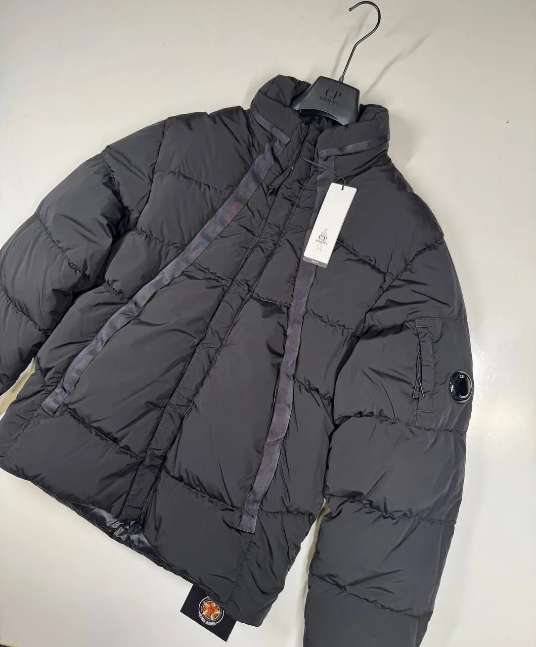 C.P. COMPANY 254A Nycra-R Down Jacket in Black - Image 1