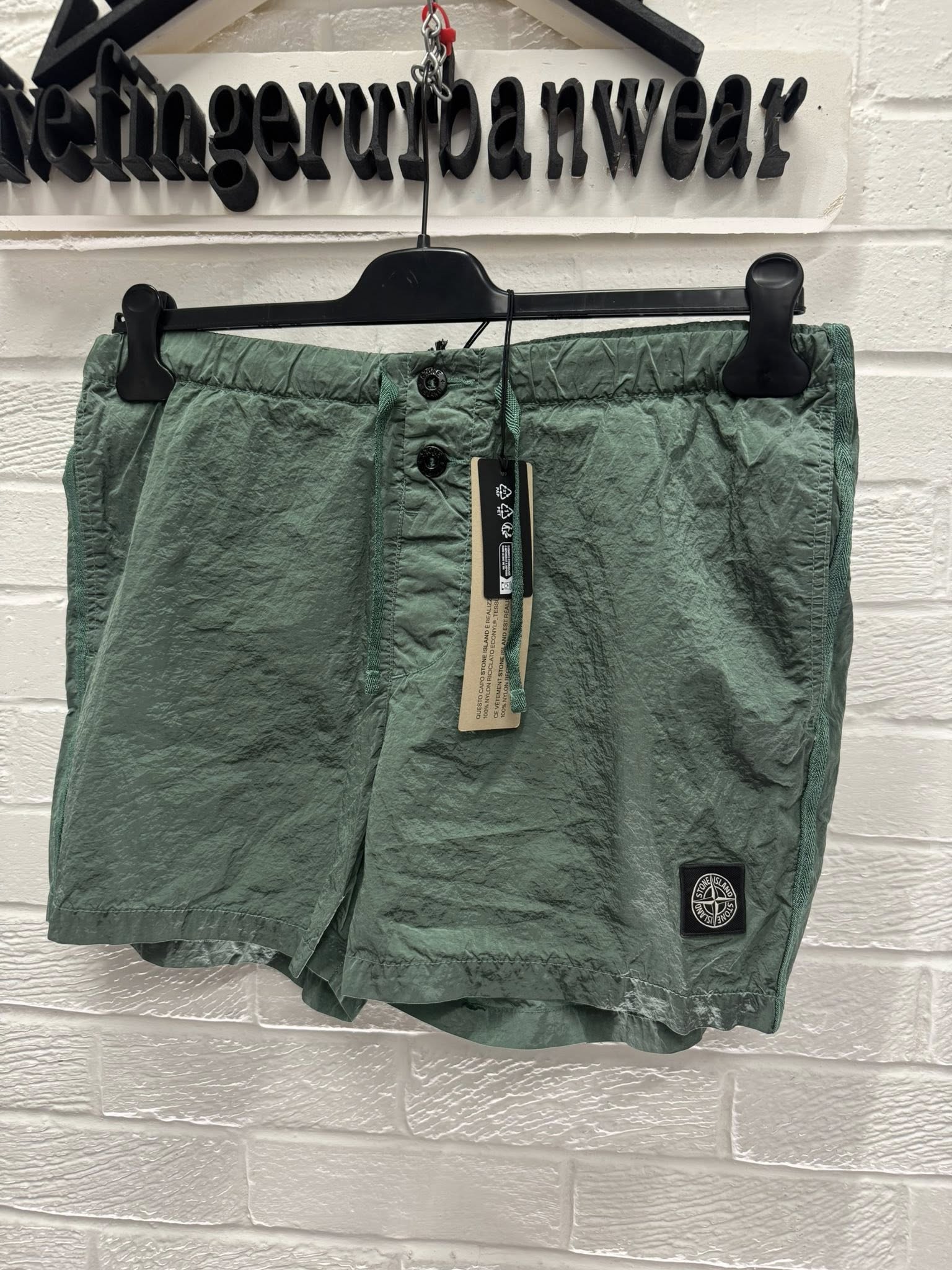 STONE ISLAND B0643 NYLON METAL IN ECONYL REGENERATED NYLON_​ GARMENT DYED Swimming trunks in Green) - Image 1