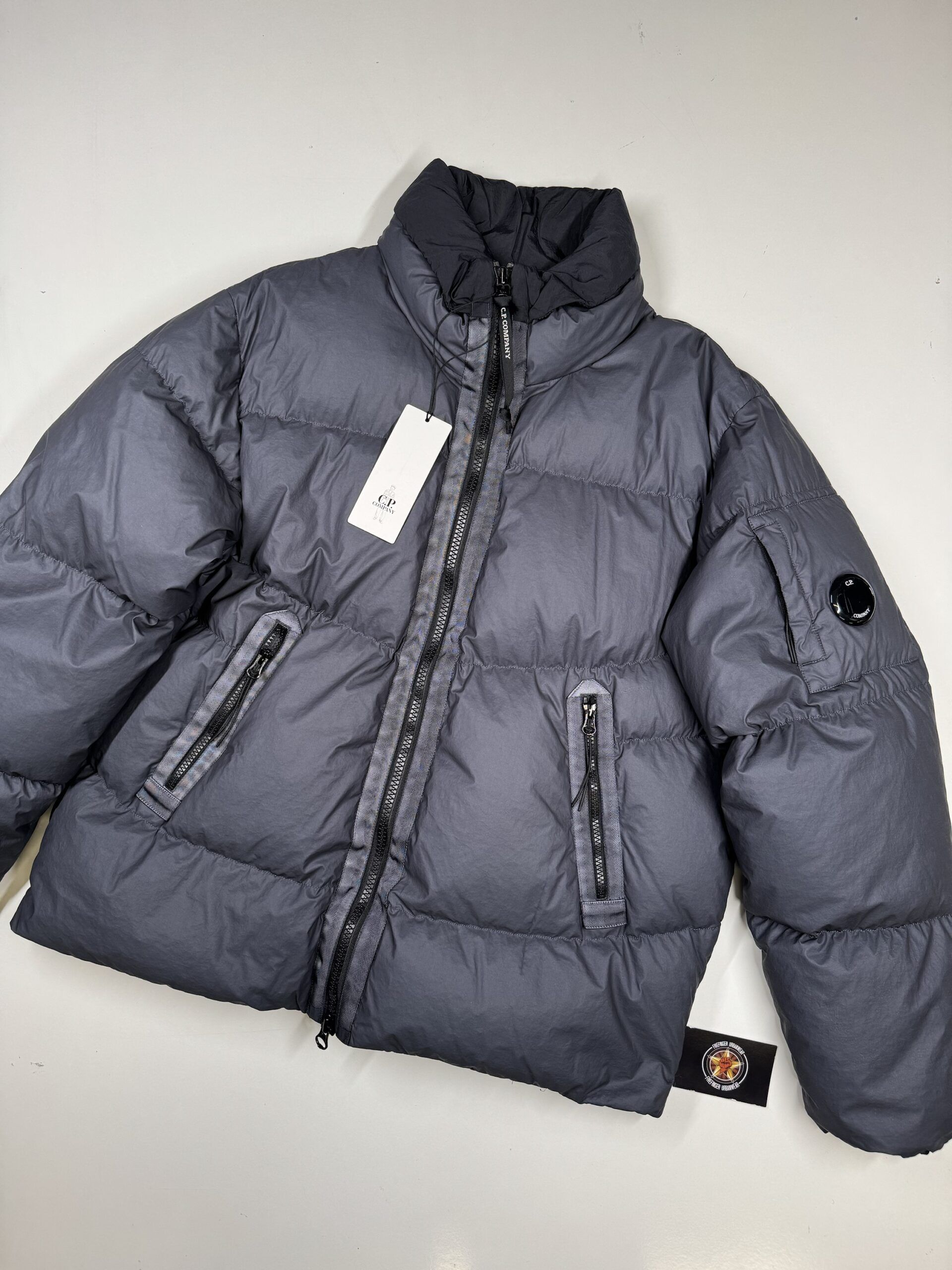 CP COMPANY 265A LENS BI-TM DOWN JACKET IN BLUE 995 - Image 1
