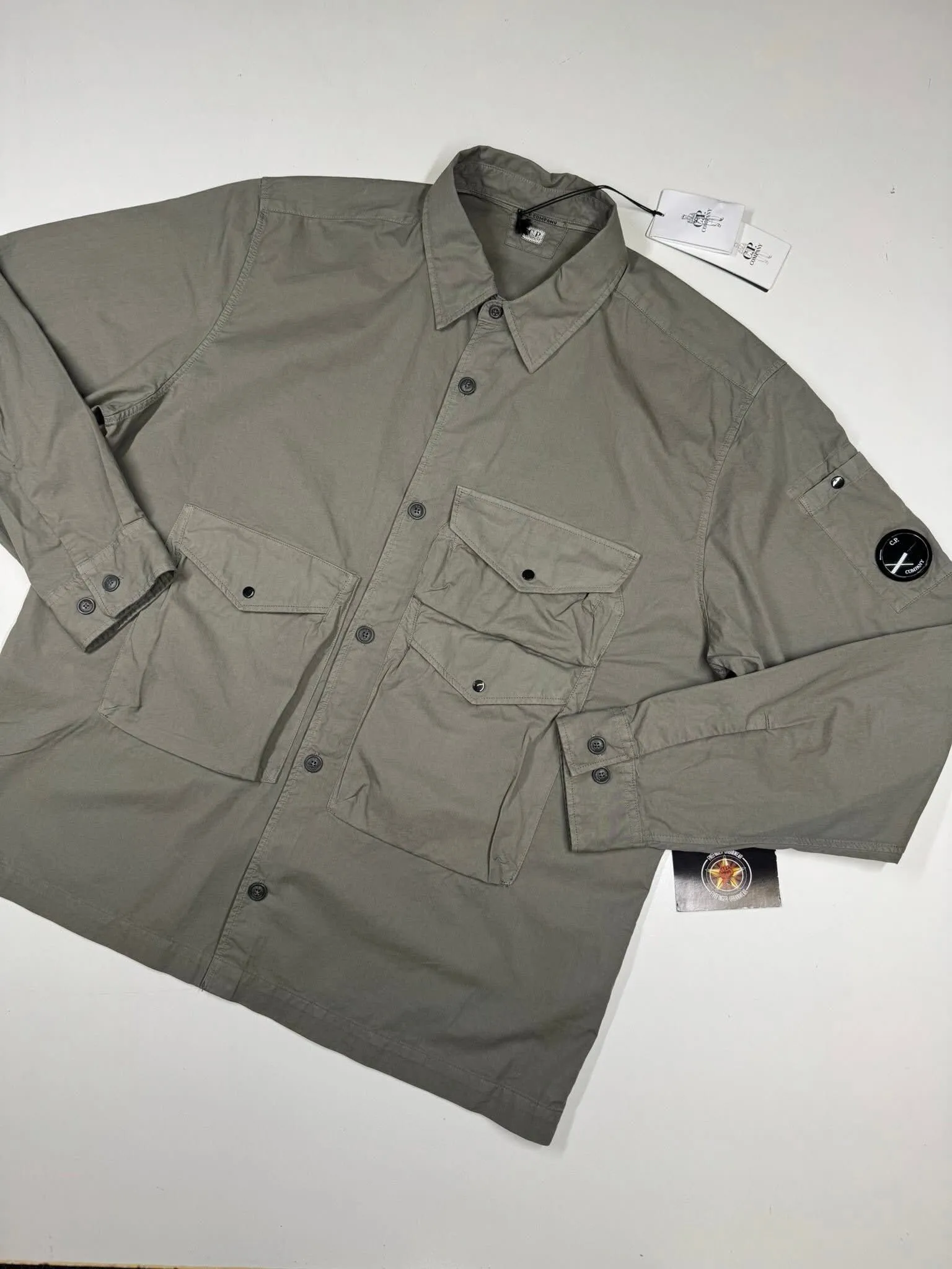 CP COMPANY ORGANIC GABARDINE BUTTONED UTILITY OVERSHIRT IN GRAPE LEAF - Image 1
