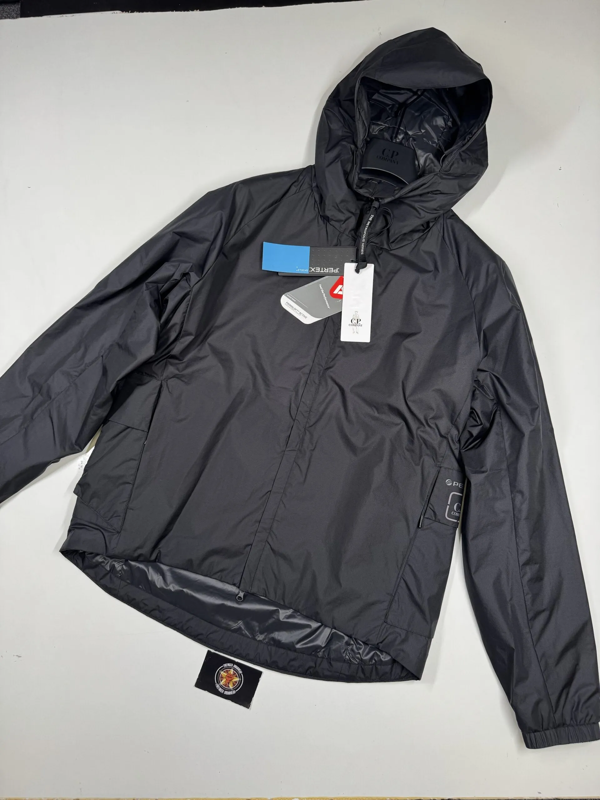 C.P. COMPANY 010A METROPOLIS PERTEX HOODED JACKET WITH PRIMALOFT  - BLACK - Image 1
