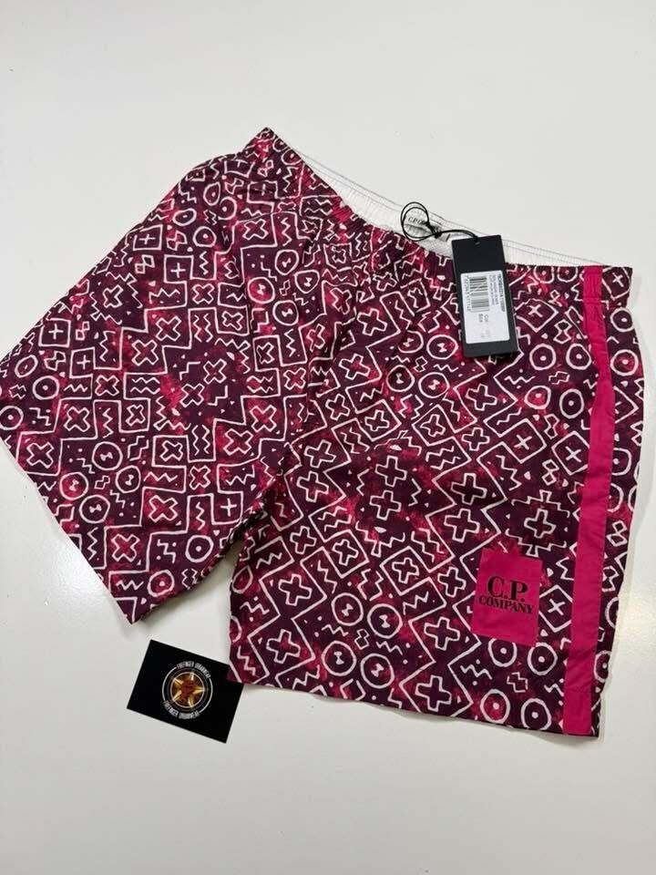 C.P. COMPANY Inca Print Swim Shorts in Flatt Nylon- Purple - Image 1