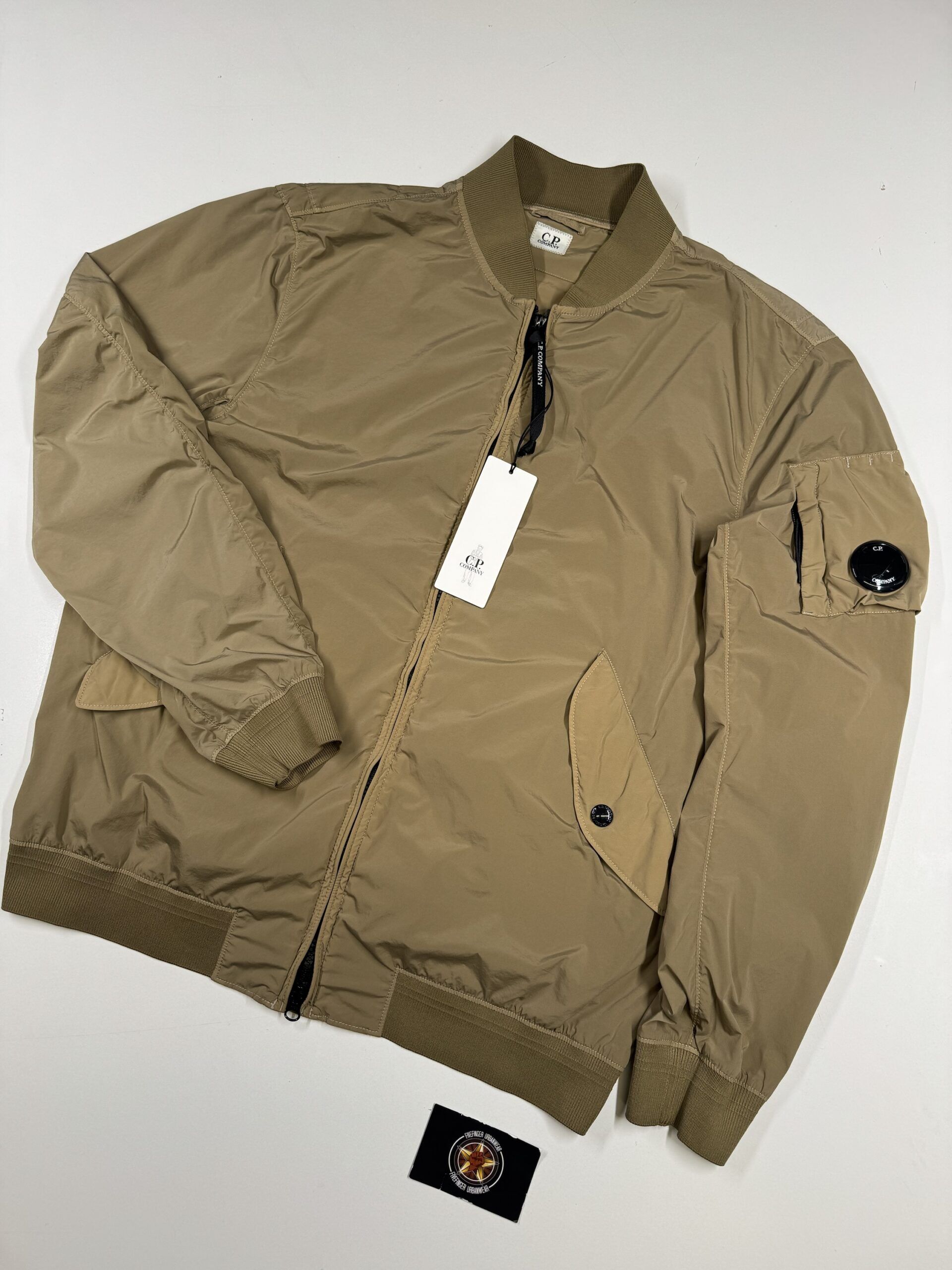 img_5540 C.P. COMPANY 182A NYCRA-R BOMBER JACKET IN VINTAGE KHAKI - Image 1