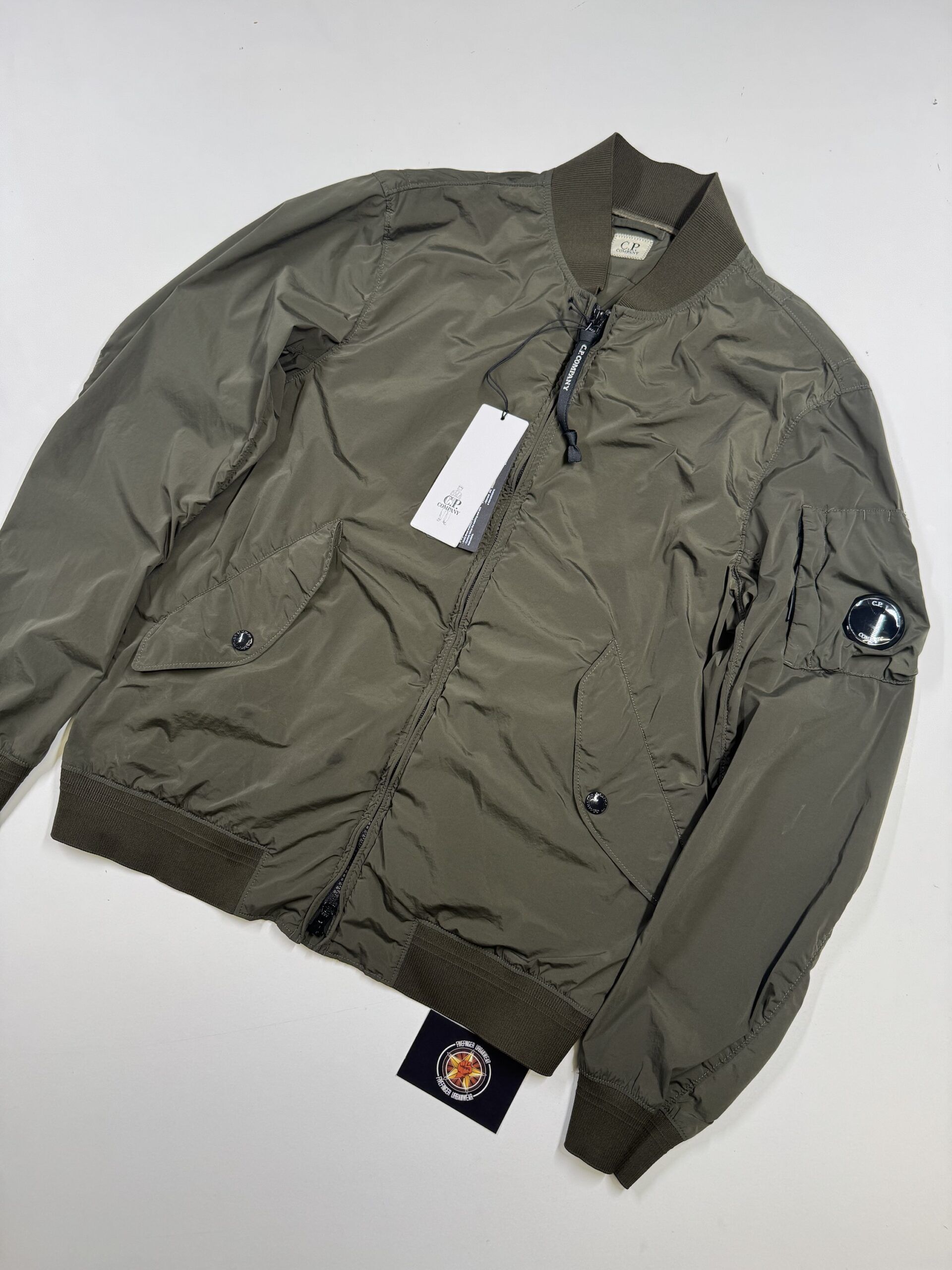 img_5885-2 C.P. COMPANY 182A NYCRA-R BOMBER JACKET IN GREEN - Medium / P2P 21.5” - Image 1