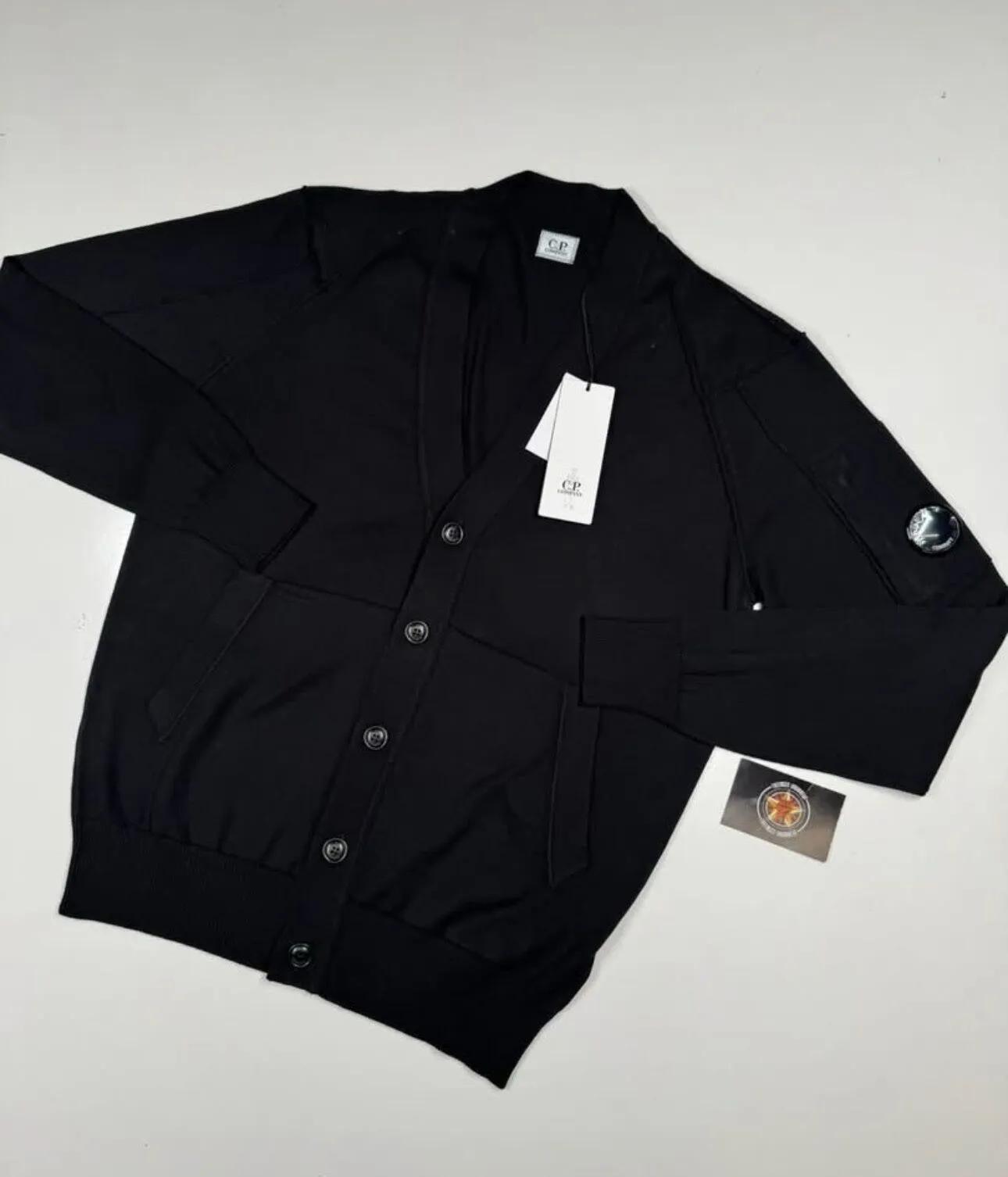 screenshot-28 CP Company 054A Sea Island Cardigan in Black. - Image 1