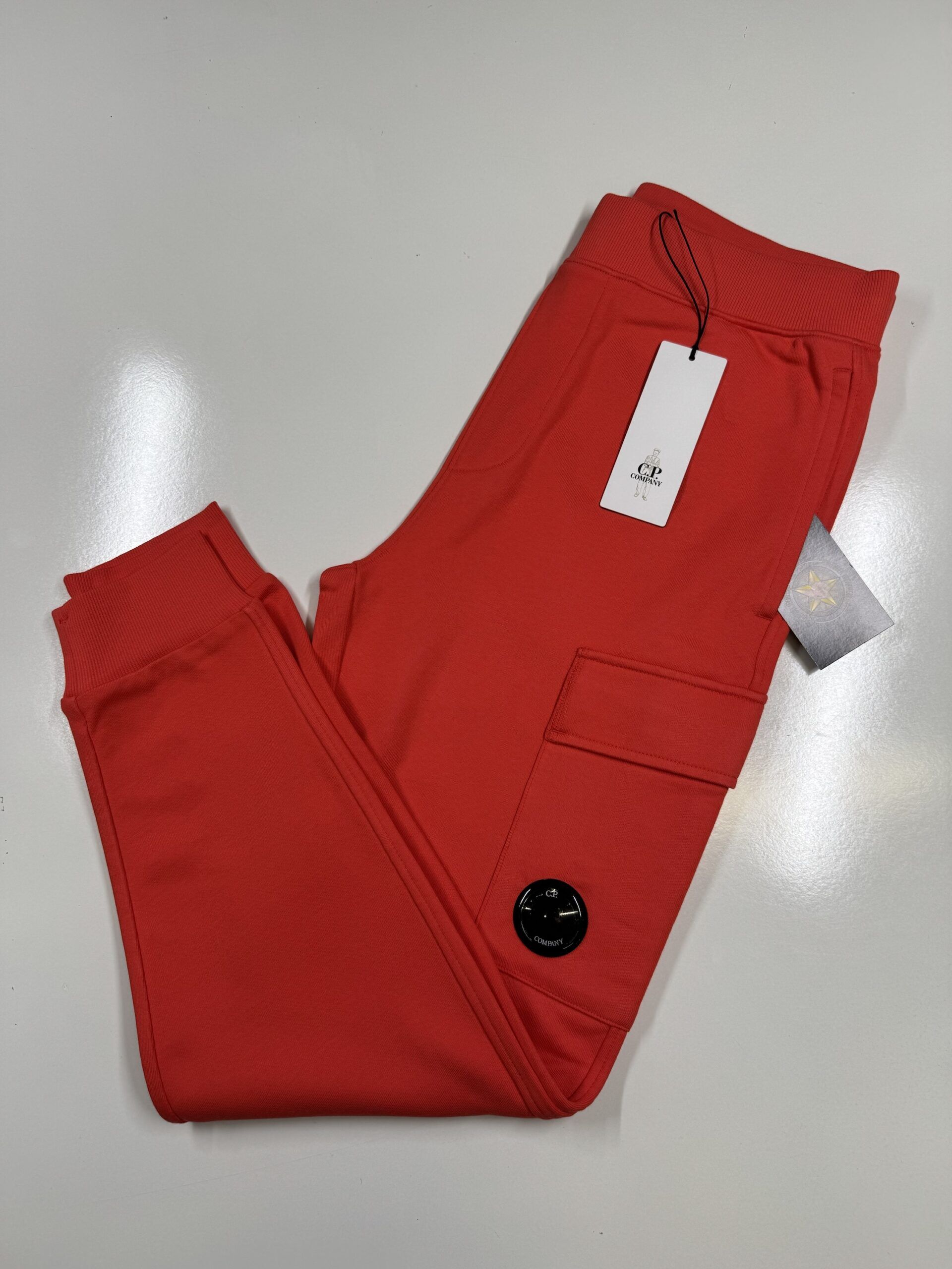 CP COMPANY 017A DIAGONAL RAISED FLEECE JOGGING PANTS IN CORAL  / 547  -   Medium / w32”. - Image 1