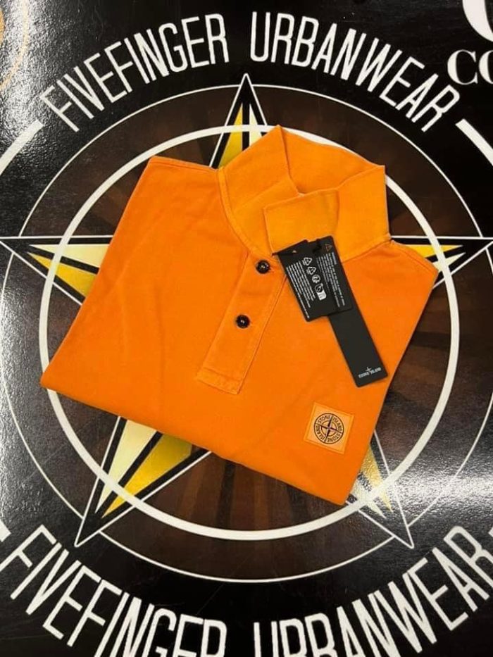 Stone island polo 2SC67 PIGMENT DYE Short-sleeve polo shirt in cotton piqué  - Orange - Image 1