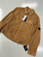 C.P. COMPANY Chrome-R Zipped Overshirt in tangerine   -  Large / 23” p2p