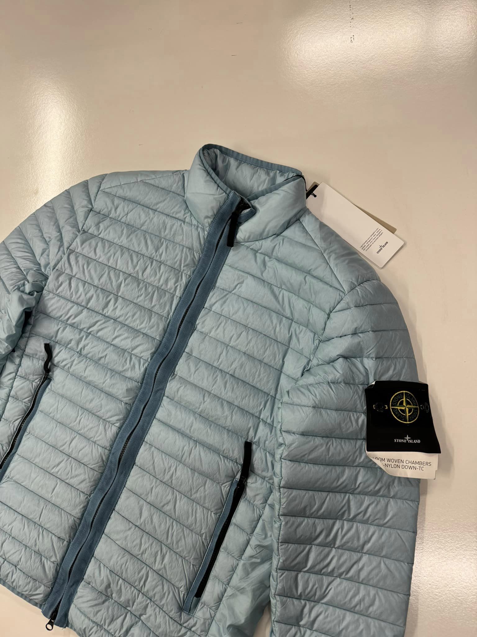 409440817_230853796709605_3322682226790273910_n STONE ISLAND 42324 LOOM WOVEN CHAMBERS R-NYLON DOWN-TC_PACKABLE DOWN JACKET IN SKY BLUE  - Large / 23.5” p2p - Image 2