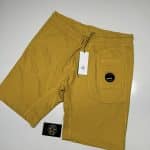 CP Company Fleece Shorts with Circular Badge Pocket - In Golden Nugget Yellow