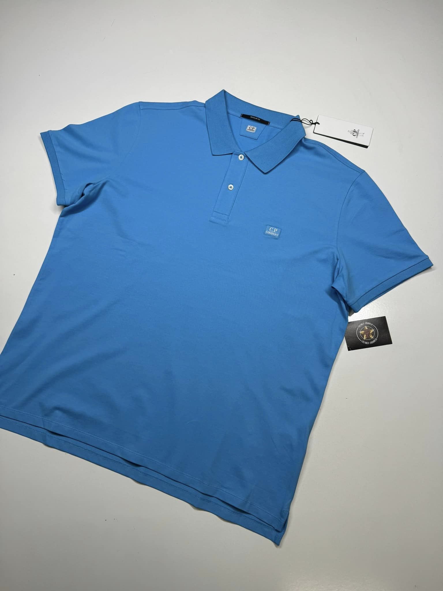 438162654_321784844283166_729736186061512046_n C.P Company Regular Fit Stretch Piquet Polo Shirt in Blue - Xs / P2p 19" - Image 1
