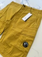 C.P. Company Satin Stretch Cargo Shorts in Golden yellow - Image 2