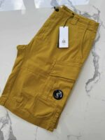 C.P. Company Satin Stretch Cargo Shorts in Golden yellow - Image 3