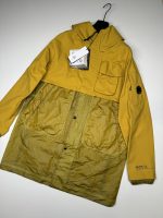 Cp Company 162A Gore-Tex Infinium Windstopper Lens long Jacket in nugget gold