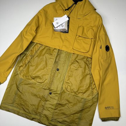 Cp Company 162A Gore-Tex Infinium Windstopper Lens long Jacket in nugget gold