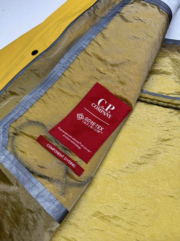 Cp Company 162A Gore-Tex Infinium Windstopper Lens long Jacket in nugget gold - Image 5