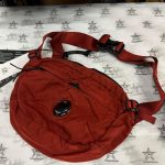 Cp Company cross bag in nylon B.  Colour - Brick Red