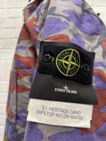 STONE ISLAND 442E1 FIELD JACKET S.I. HERITAGE CAMO RIPSTOP NYLON WATRO_DETACHABLE LINING IN NYLON METAL IN ECONYL® REGENERATED.


Large / P2P  24” - Image 13