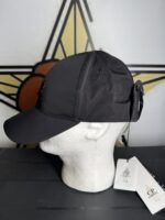 CP COMPANY CHROME GOGGLE CAP IN BLACK.

Size Large - Image 5