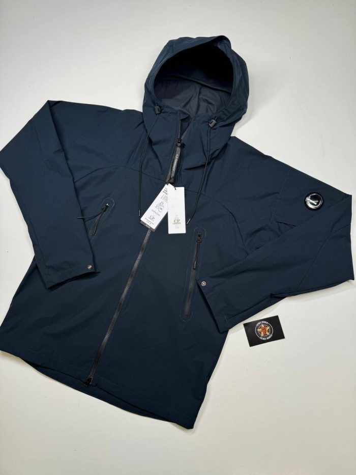 CP COMPANY PRO TEK LENS JACKET IN NAVY - Image 1