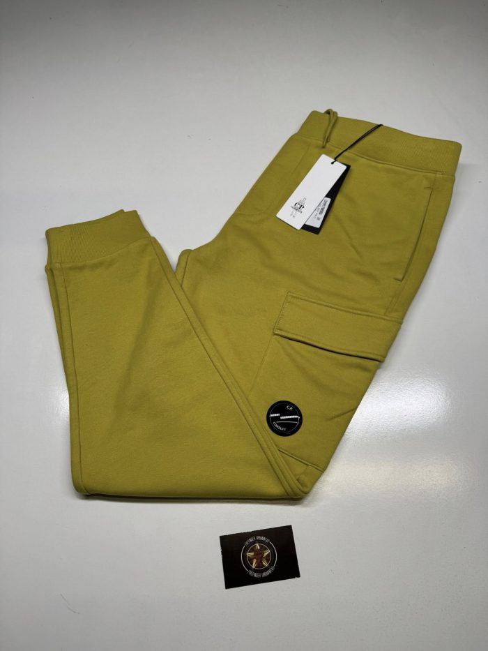 CP COMPANY 017A DIAGONAL RAISED FLEECE JOGGING PANTS IN MUSTARD - Image 1
