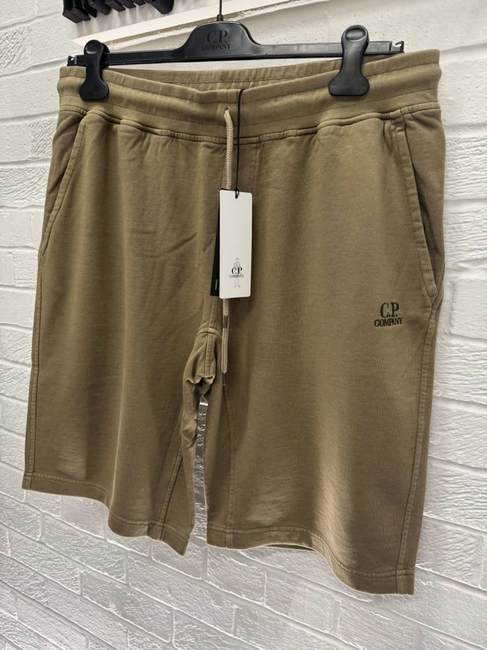 CP COMPANY COTTON FLEECE JOGGING BERMUDA IN LIGHT BROWN - Image 1