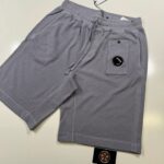 CP COMPANY 268a MALFILE FLEECE POCKET JOGGING BERMUDA IN LILAC