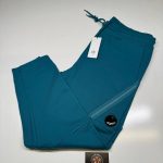 CP COMPANY 017A DIAGONAL RAISED FLEECE JOGGING PANTS IN TEAL BLUE. -  XXL  / w38”