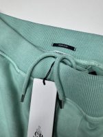 CP Company Brushed & Emerized Diagonal Fleece Track Pants in Green - Image 2
