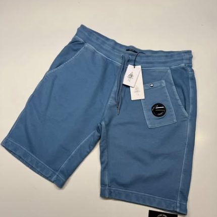 CP Company resist dyed Bermuda shorts in brushed emerized diagonal fleece - blue