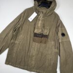 C.P. COMPANY 150a Ba-Tic  Hooded Jacket in Butternut Green / 653