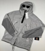 C.P. COMPANY 220A 50 FILI GUM GOGGLE JACKET IN DRISSLE GREY