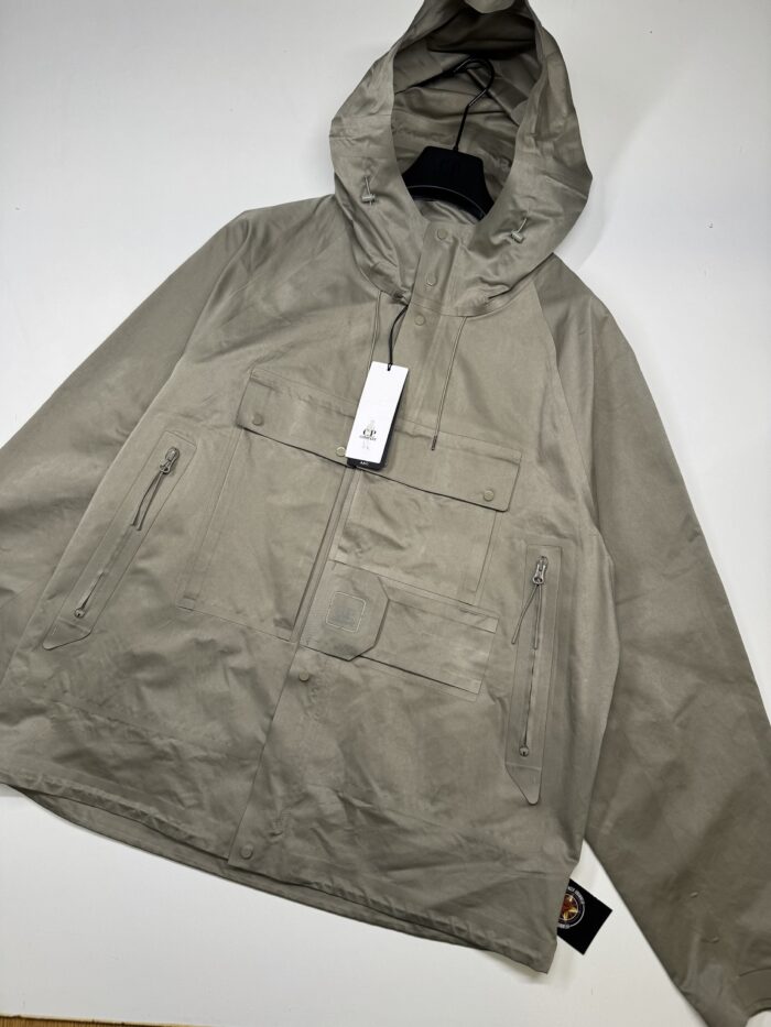 CP Company 011A Metropolis Series A.A.C. Hooded Jacket

Size 58 / XXXXL / p2p 27” - Image 1