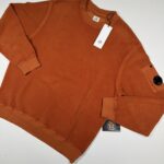 CP Company 285A Brushed & Emerized Diagonal Fleece Sweatshirt in Pumkin Orange