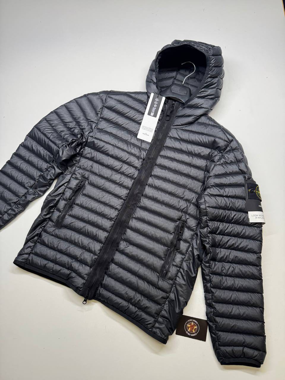 542761542_698989459896034_7108489673929956495_n STONE ISLAND 40324 HOODED LIGHTWEIGHT DOWN JACKET IN BLACK - XXL / P2P 26.5” - Image 1