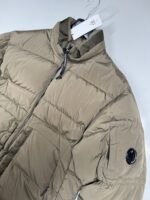 CP COMPANY NYCRA-R DOWN JACKET IN VINTAGE KHAKI  - Large / 24” P2P - Image 3