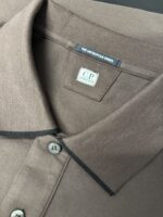 C.P COMPANY STRETCH PIQUET POLO SHIRT IN BROWN - Image 8