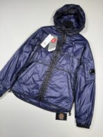 C.P. COMPANY 038A NADA SHELL LENS JACKET WITH  PRIMALOFT COLOUR: ESTATE BLUE    -  Small   / 21” P2P