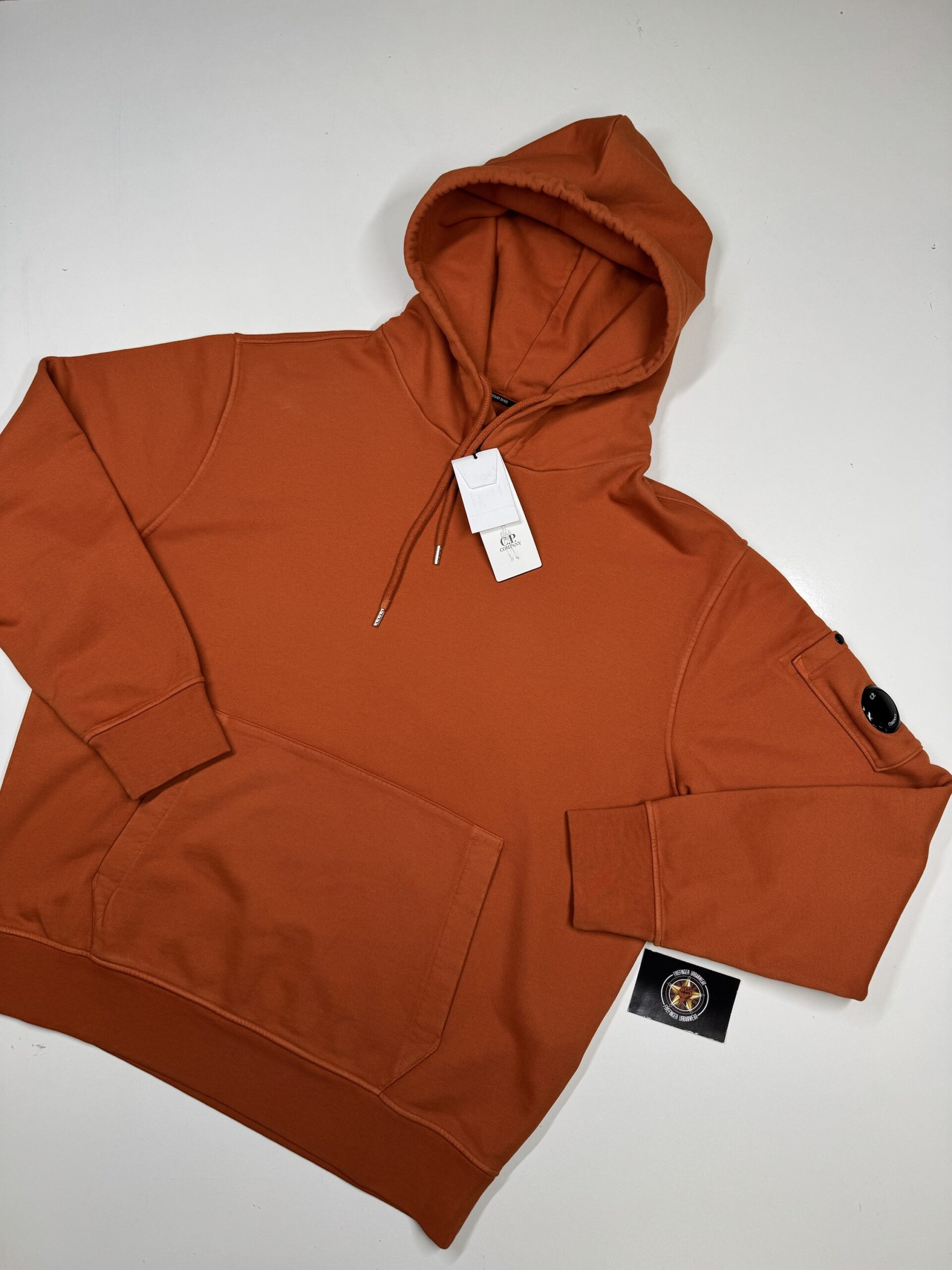 img_9102 CP Company 061A Brushed Emerized Diagonal Fleece Hoodie in Pumpkin Orange. - Image 1