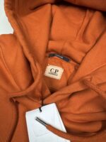 CP Company 061A Brushed Emerized Diagonal Fleece Hoodie in Pumpkin Orange. - Image 3