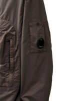 CP COMPANY 132A FLATT NYLON HOODED LENS OVERSHIRT IN BOULEVARD VIOLET. - Image 12